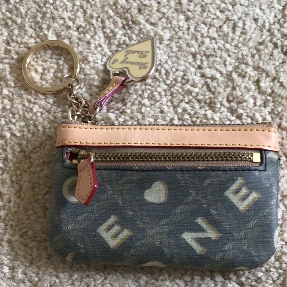 Dooney and Bourke coin purse with key ring.